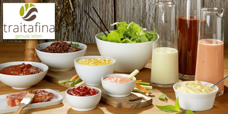 Das Unternehmen bietet auch ein breites Sortiment an Saucen und Salatdressings an Das Unternehmen bietet auch ein breites Sortiment an Saucen und Salatdressings an