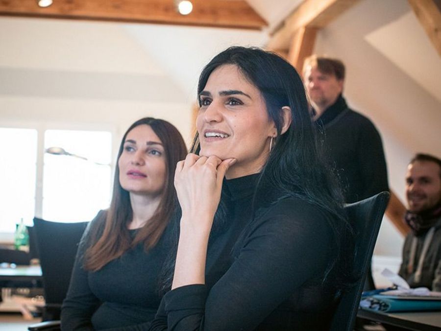 Gemeinsam erfolgreich: Mitglieder des Teams im Gespräch Gemeinsam erfolgreich: Mitglieder des Teams im Gespräch
